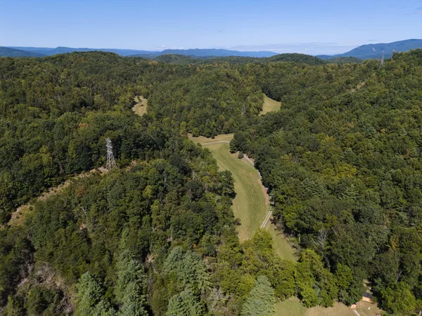 a view of a city with mountains in the background