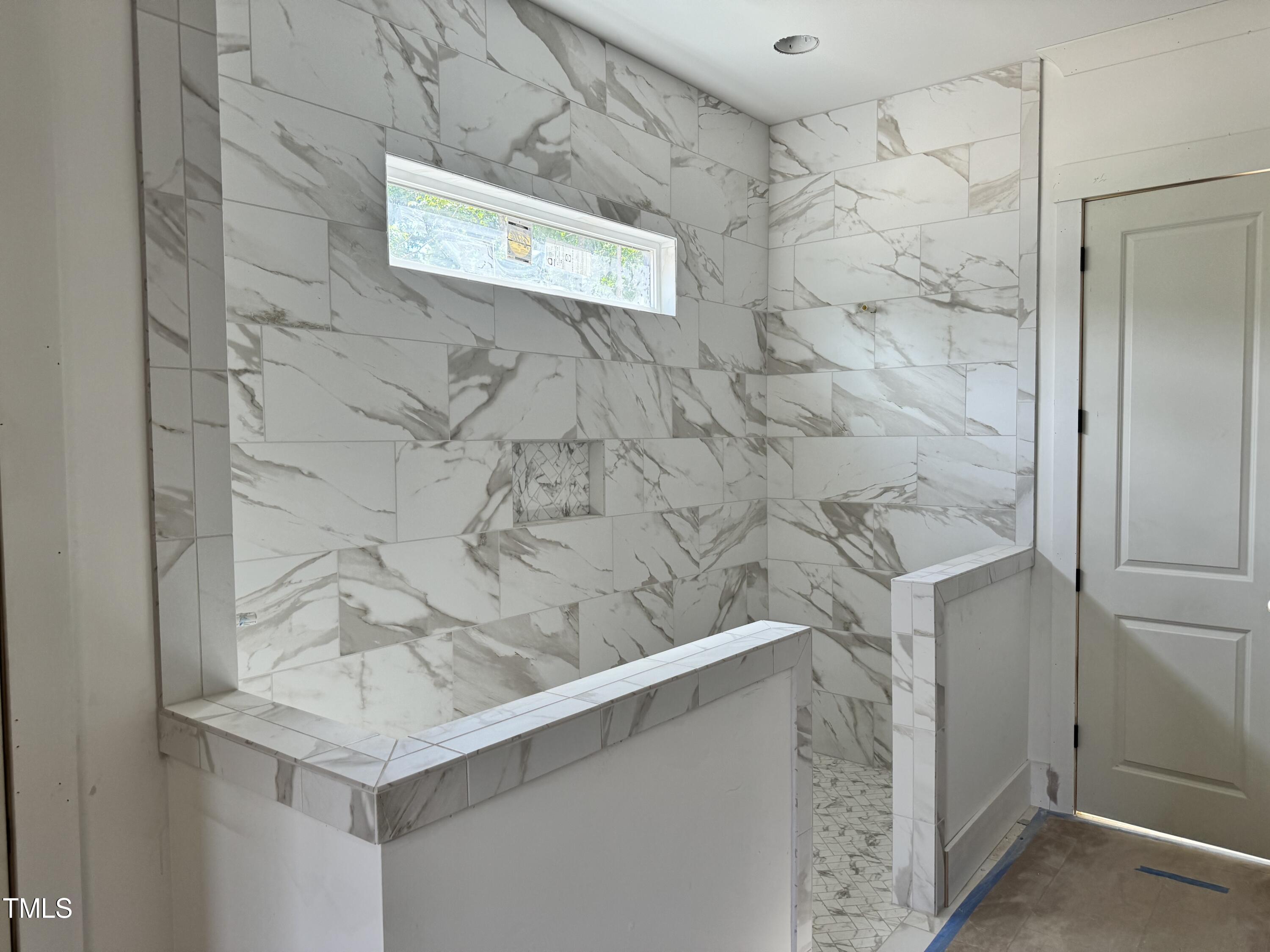 8544 Hurst Drive Raleigh, NC 27603 - Photo 16 of 26 a bathroom with a sink and mirror