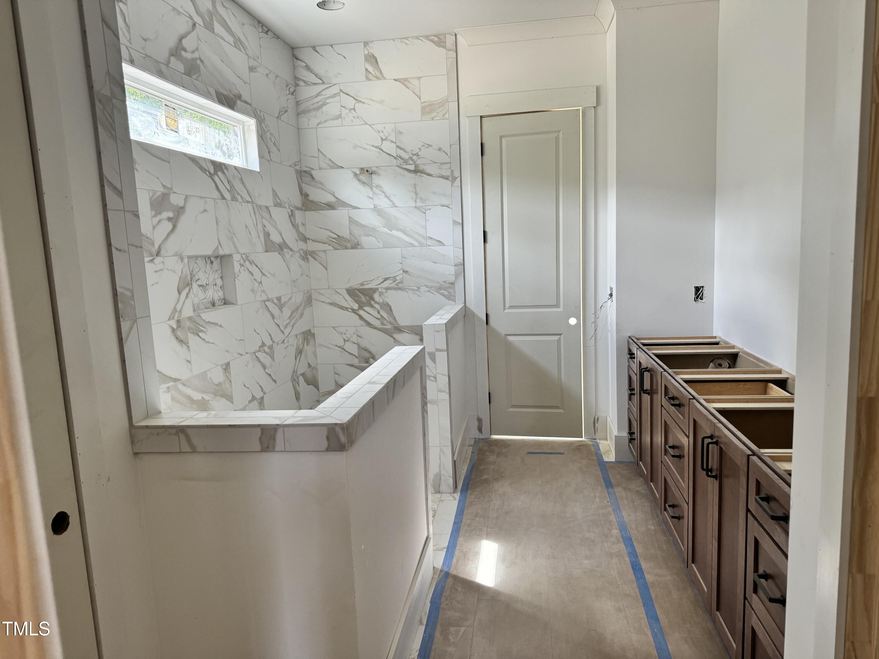 8544 Hurst Drive Raleigh, NC 27603 - Photo 17 of 26 a view of a kitchen from the hallway