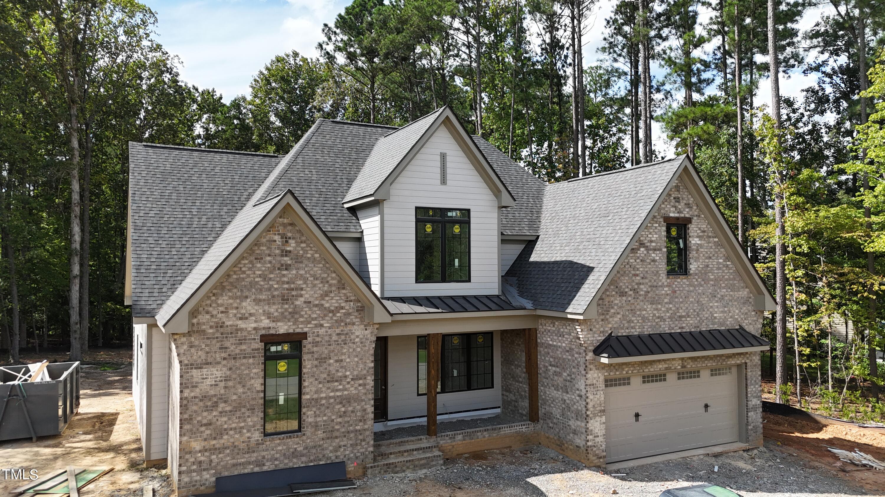 8544 Hurst Drive Raleigh, NC 27603 - Photo 3 of 26 a view of a house with a yard