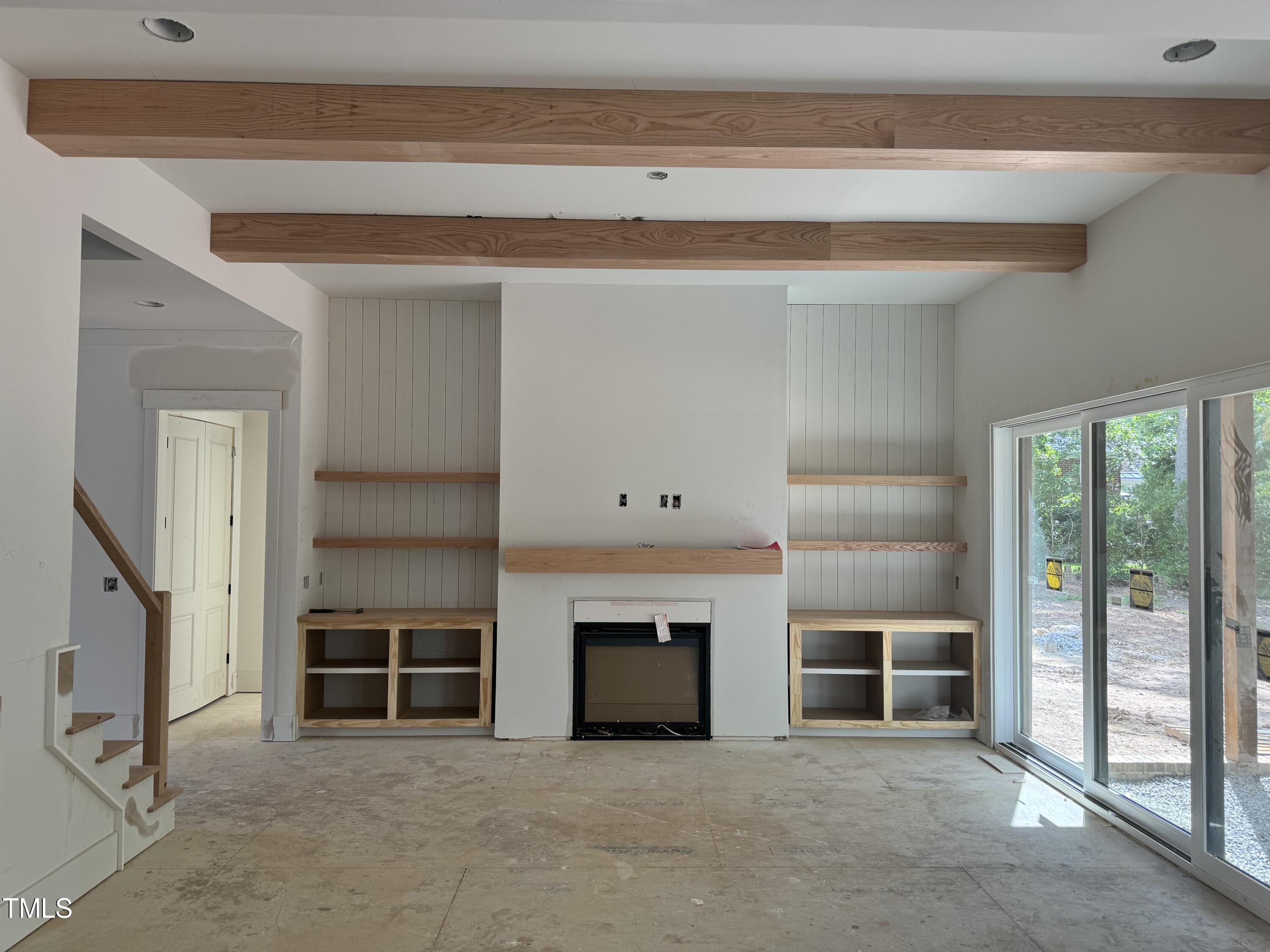 8544 Hurst Drive Raleigh, NC 27603 - Photo 7 of 26 a view of a livingroom with an empty space