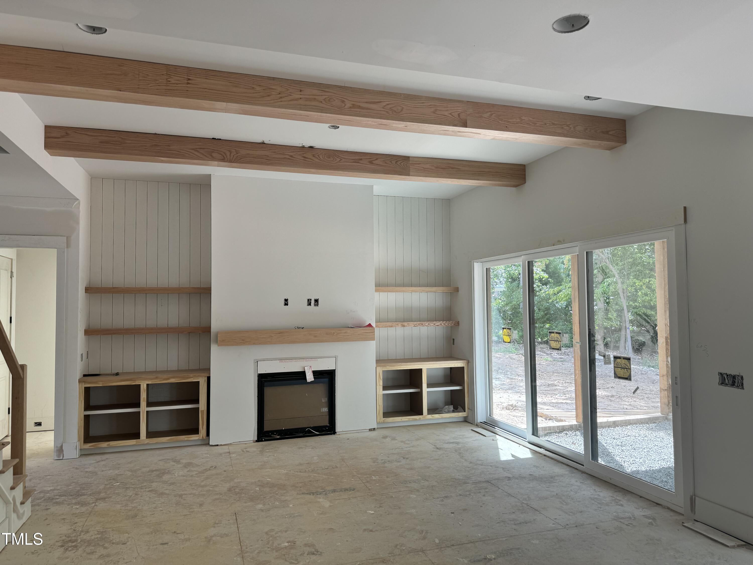 8544 Hurst Drive Raleigh, NC 27603 - Photo 8 of 26 a view of a livingroom with an empty space and fireplace