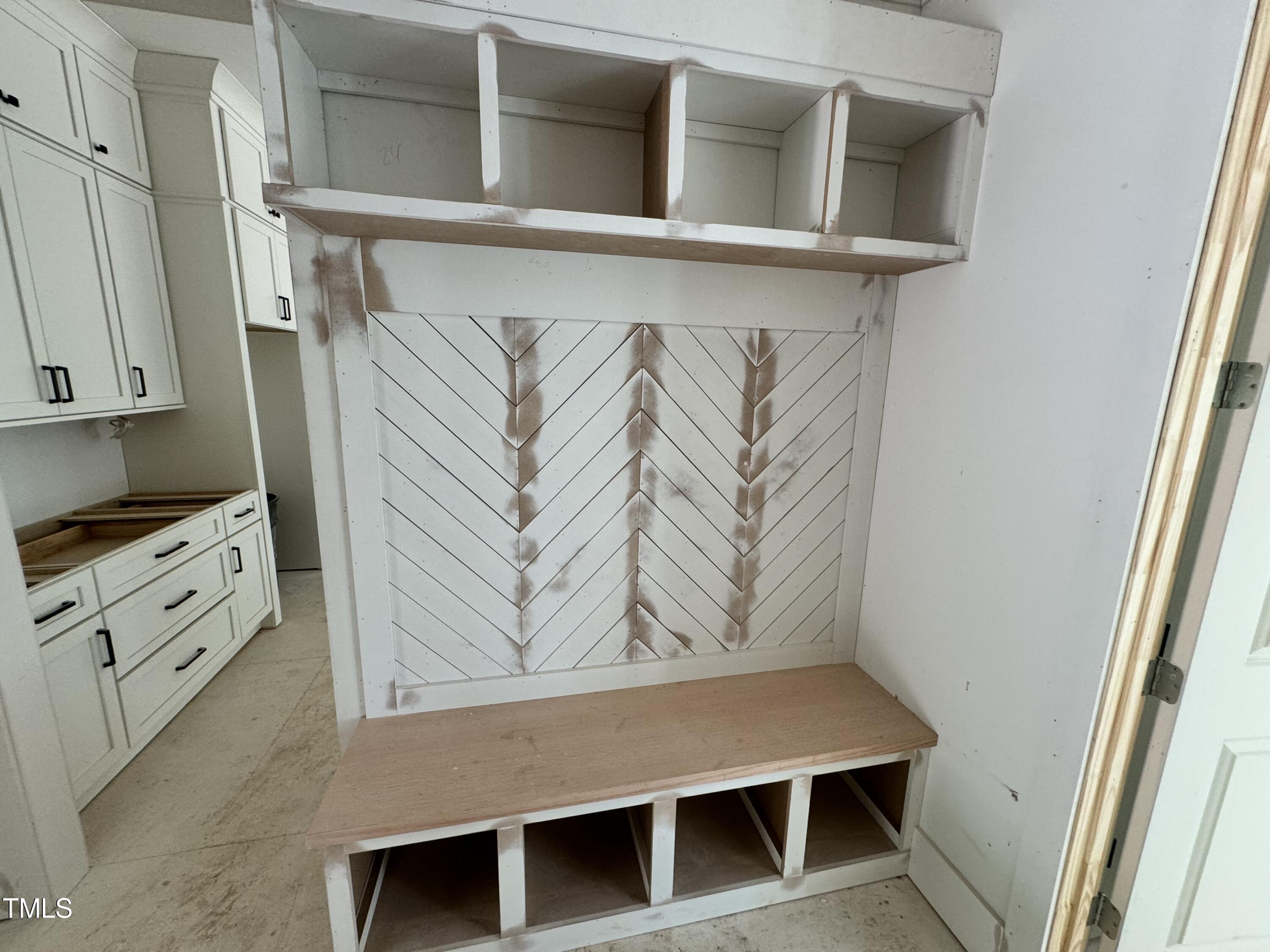 8544 Hurst Drive Raleigh, NC 27603 - Photo 10 of 26 a view of cabinets and chair