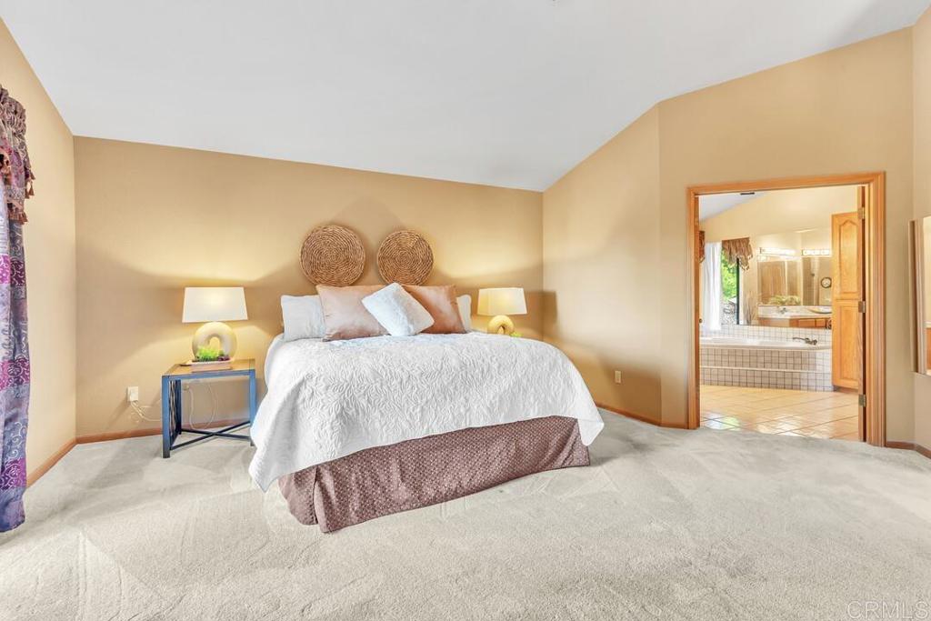 2302 Shaylene Way Alpine, CA 91901 - Photo 13 of 46 a spacious bedroom with a bed and a area