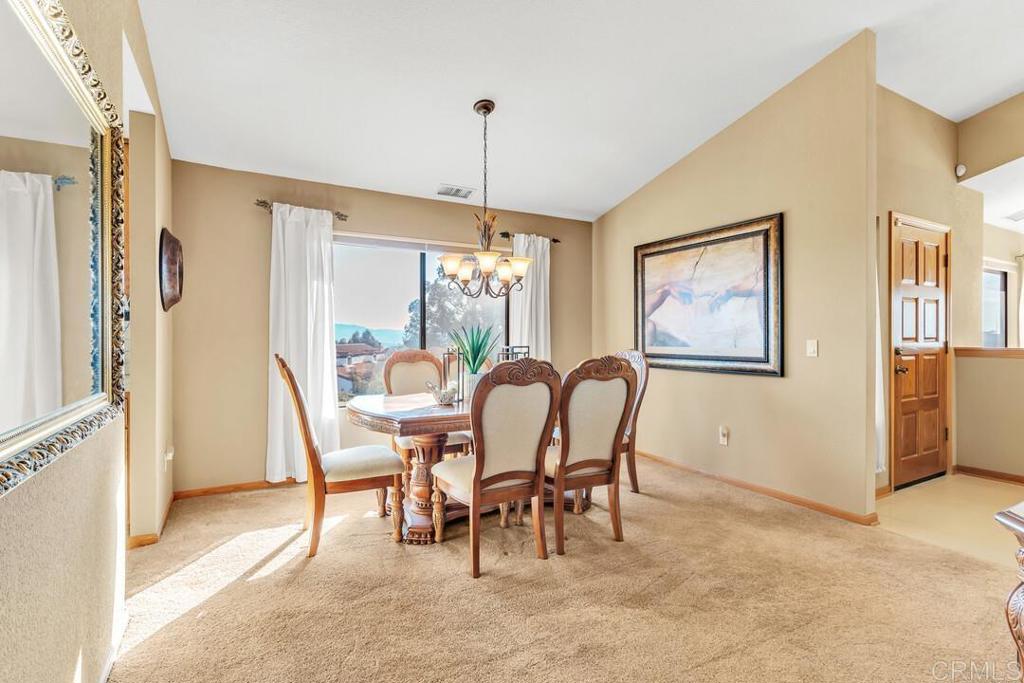 2302 Shaylene Way Alpine, CA 91901 - Photo 22 of 46 a view of a dining room with furniture window and outside view