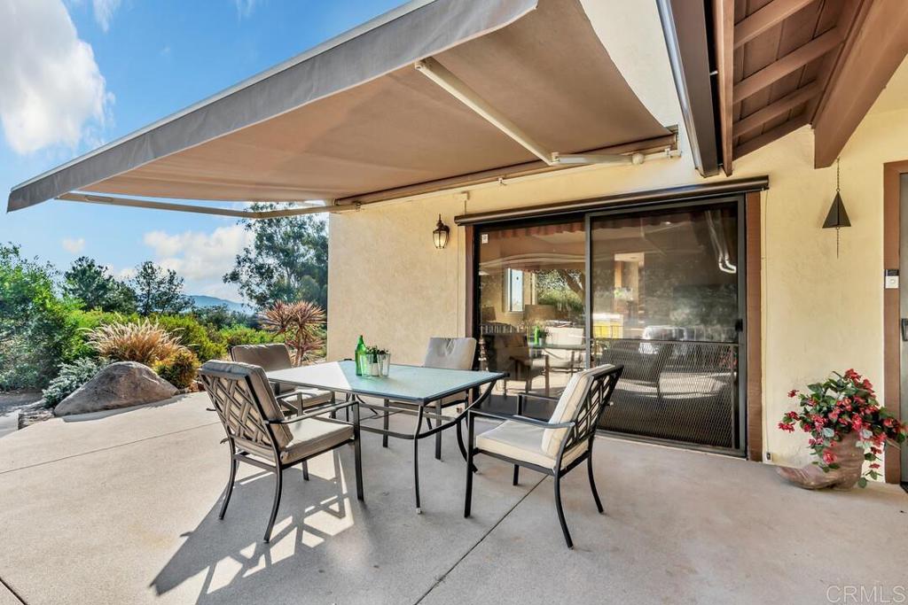 2302 Shaylene Way Alpine, CA 91901 - Photo 29 of 46 a view of an outdoor dining space with a table and chairs