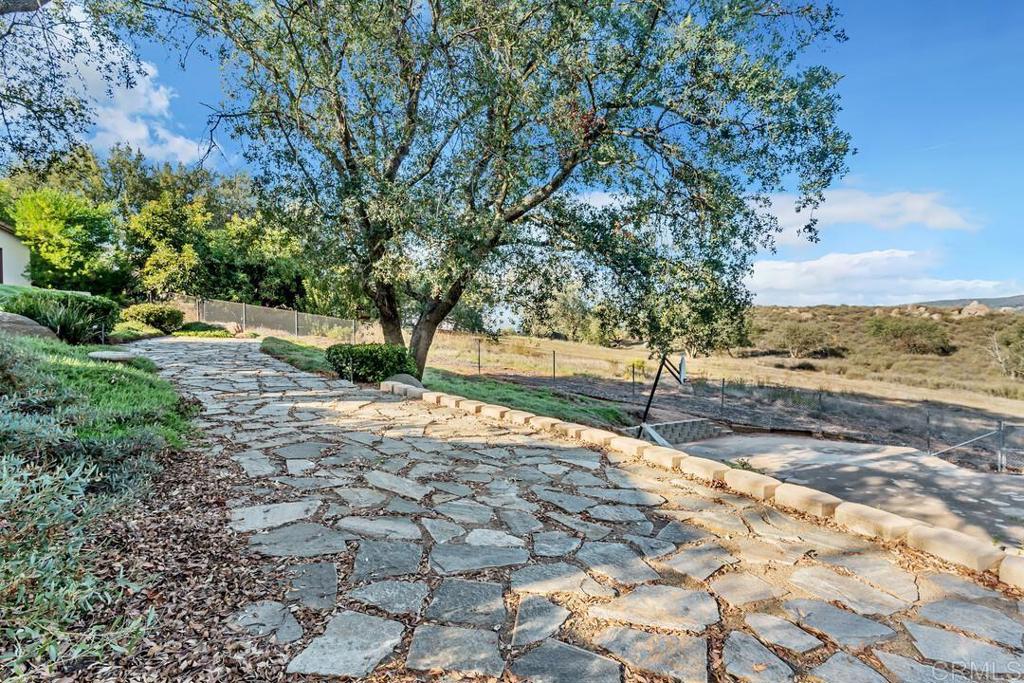 2302 Shaylene Way Alpine, CA 91901 - Photo 36 of 46 a view of a yard with plants and trees