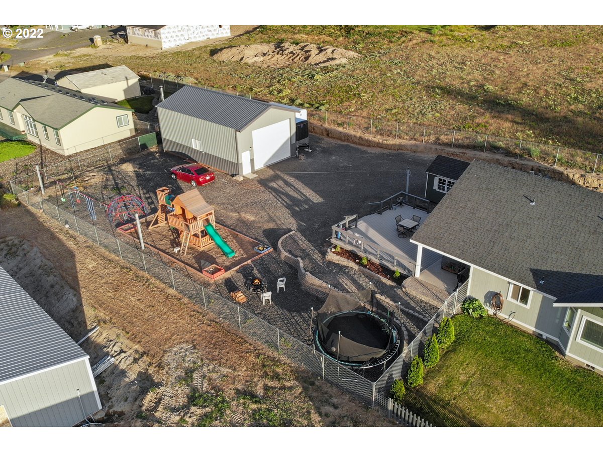 1370 Childers Road Arlington, OR 97812 - Photo 30 of 31 an aerial view of a house with a garden
