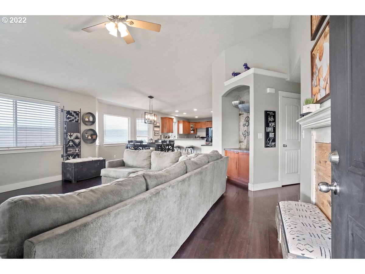 1370 Childers Road Arlington, OR 97812 - Photo 7 of 31 a living room with furniture and a wooden floor
