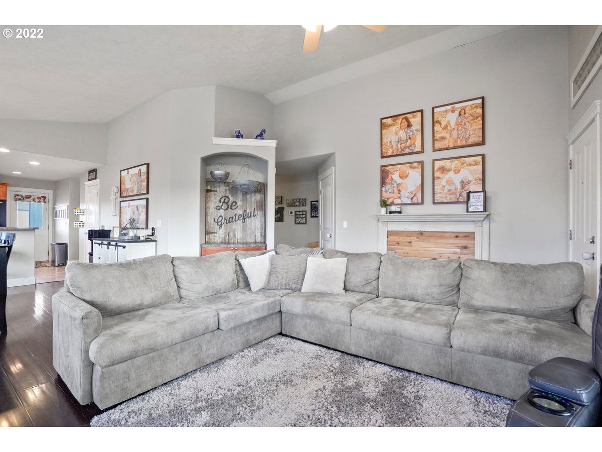 1370 Childers Road Arlington, OR 97812 - Photo 9 of 31 a living room with furniture and a large window