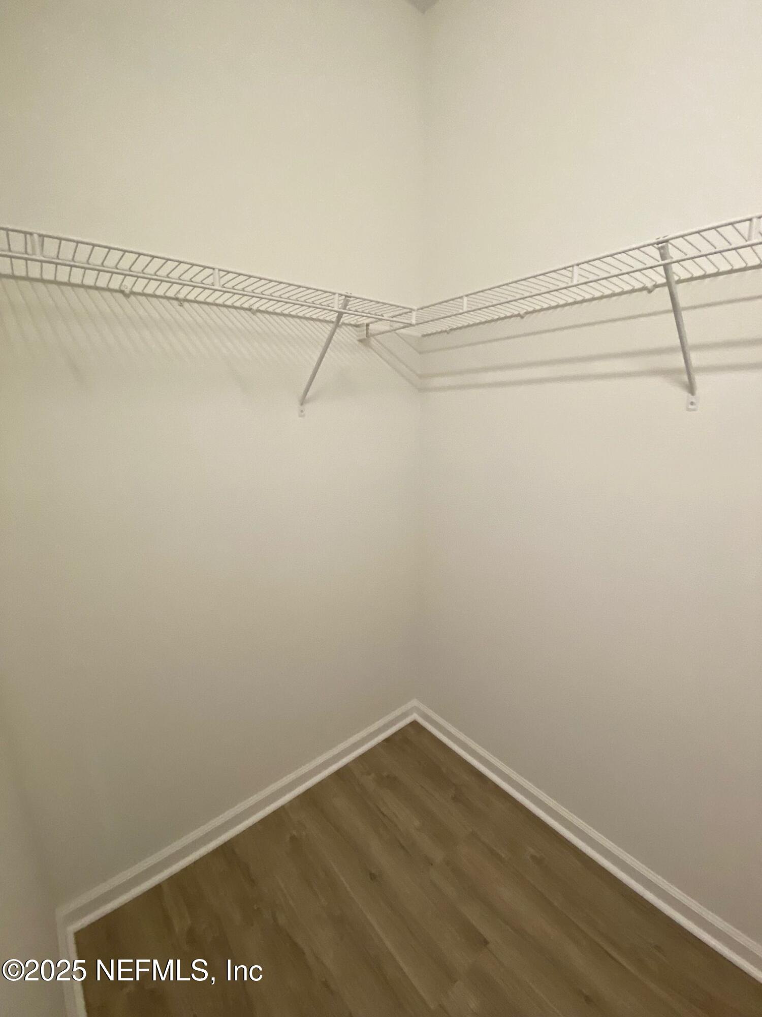 7990 Baymeadows Road, Unit 929 Jacksonville, FL 32256 - Photo 21 of 26 a view of a room with racks on the wall