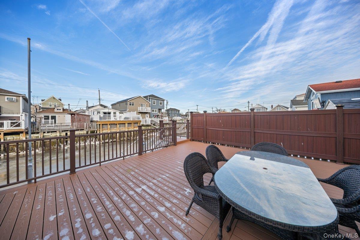 19 West 13th Road Queens, NY 11693 - Photo 12 of 19 a view of a balcony and chairs