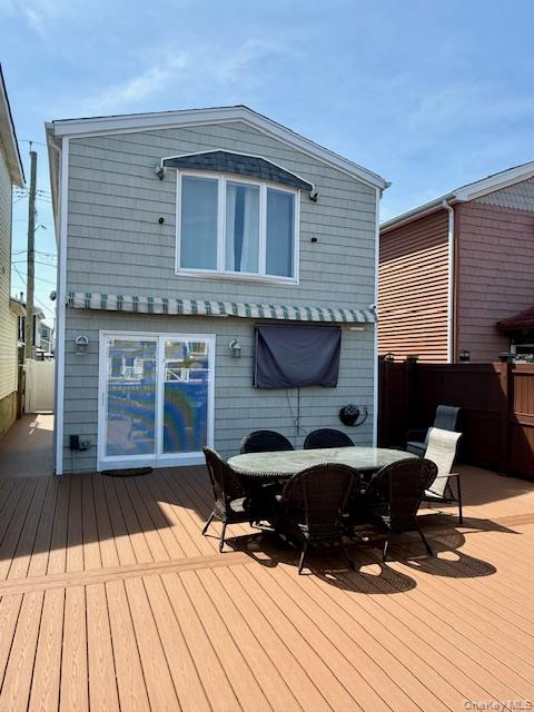 19 West 13th Road Queens, NY 11693 - Photo 15 of 20 a roof deck view with table and chairs