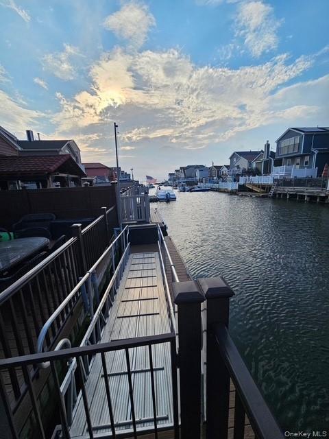 19 West 13th Road Queens, NY 11693 - Photo 17 of 19 a view of a balcony with ocean view