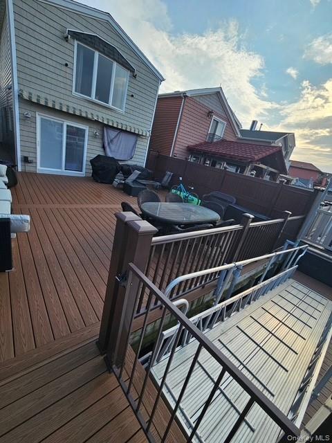 19 West 13th Road Queens, NY 11693 - Photo 18 of 19 a roof deck view with table and chairs