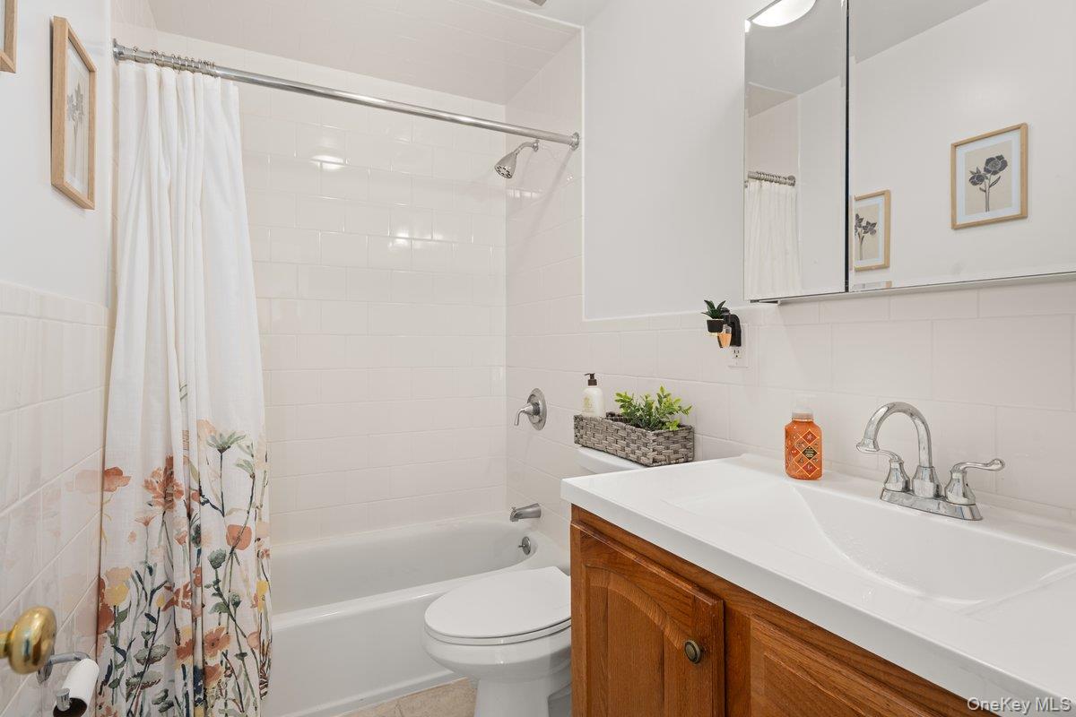 19 West 13th Road Queens, NY 11693 - Photo 5 of 19 a bathroom with a sink toilet and shower
