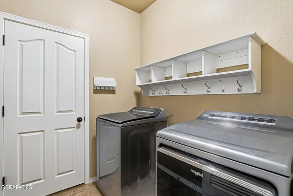 a living room with furniture and a gate