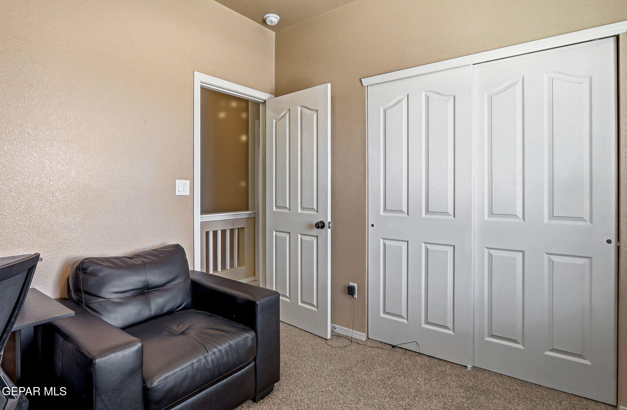 612 Bell Gordon Street Anthony, TX 79821 - Photo 24 of 64 a living room with furniture and a gate