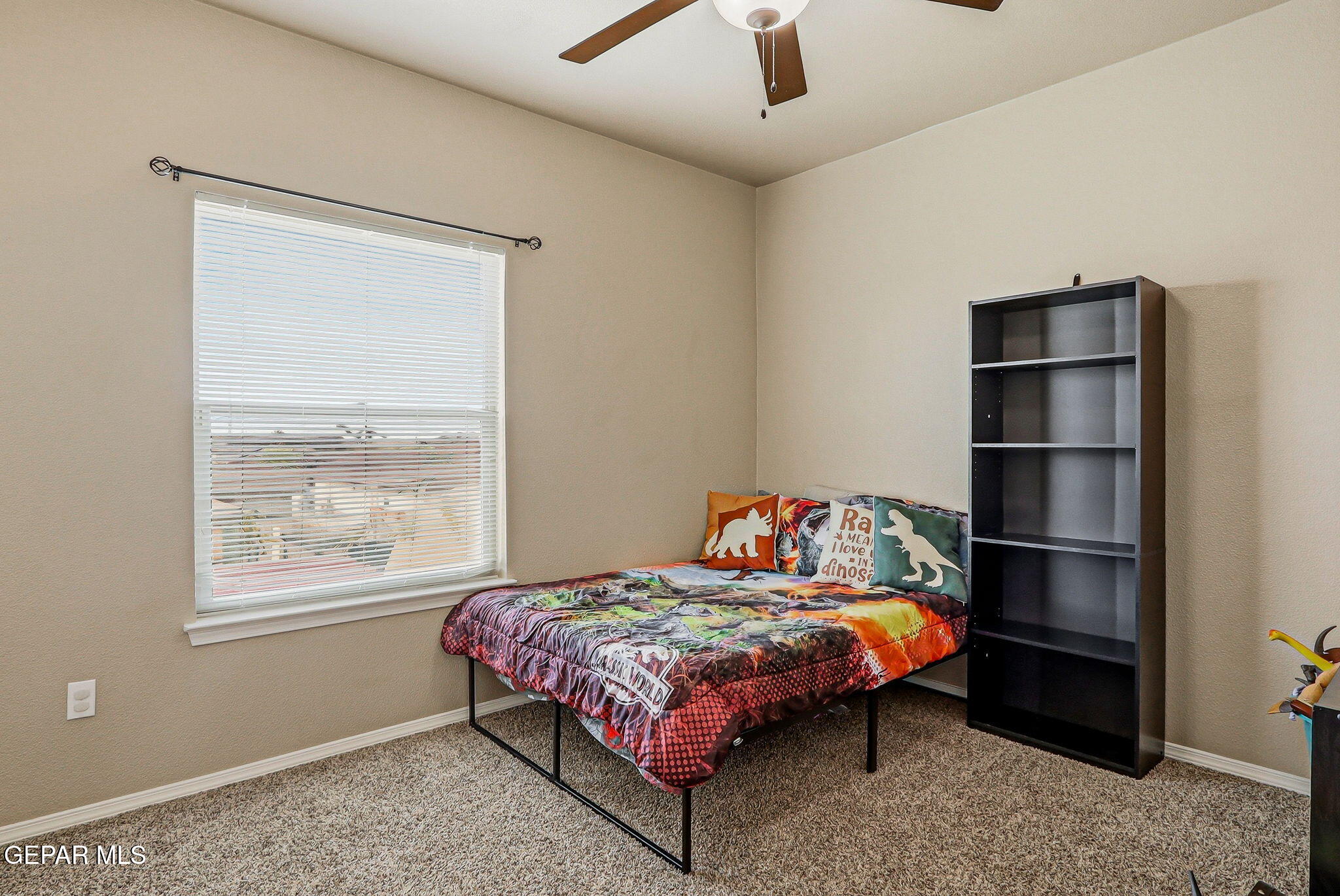 612 Bell Gordon Street Anthony, TX 79821 - Photo 27 of 64 a bedroom with a bed closet and window