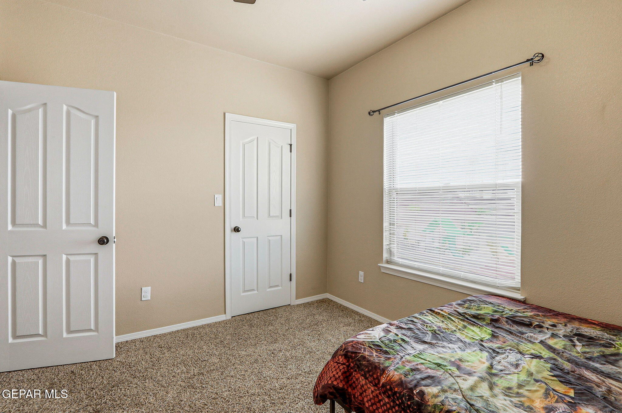 612 Bell Gordon Street Anthony, TX 79821 - Photo 28 of 64 a bedroom with a bed and a window