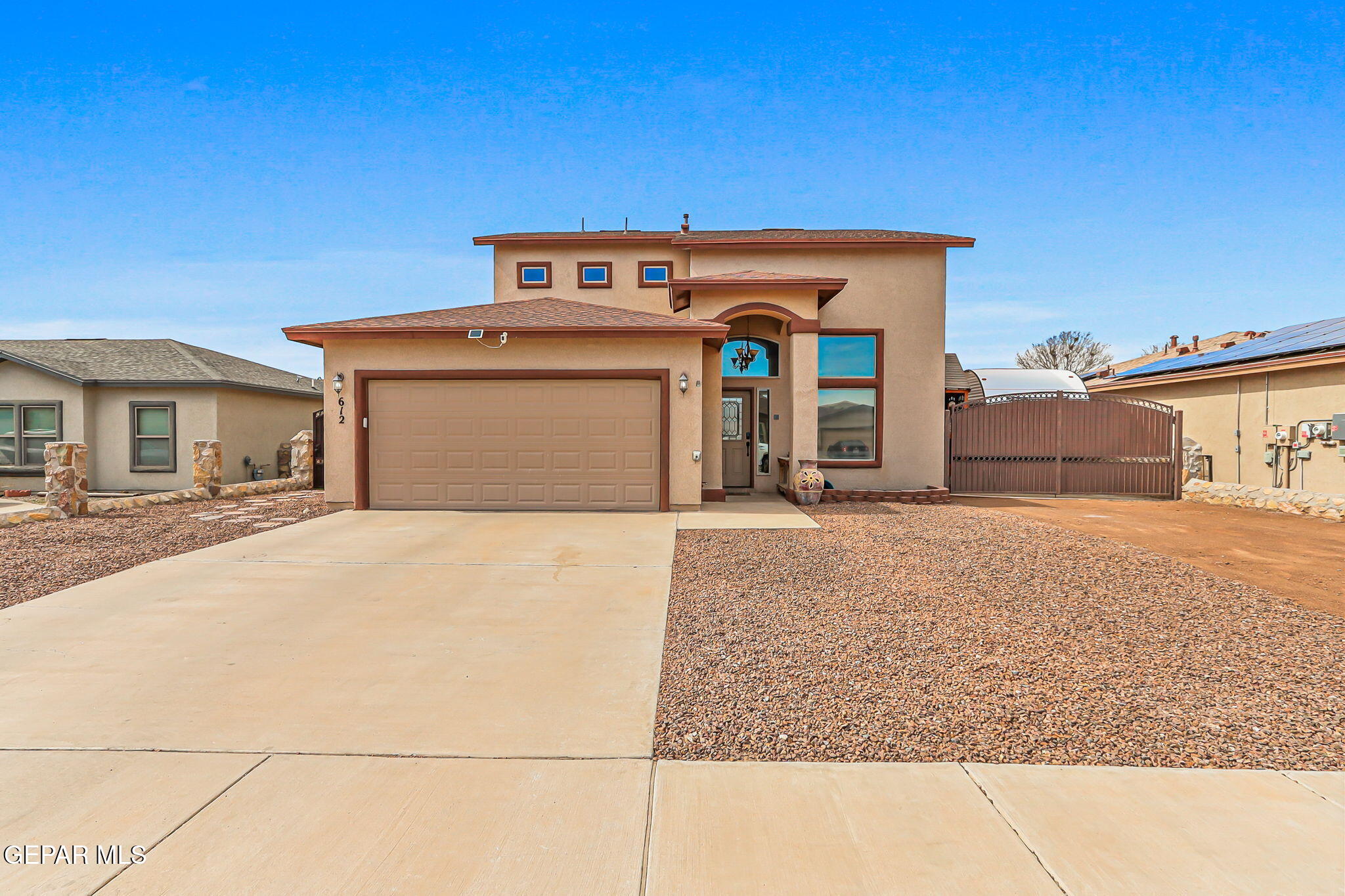612 Bell Gordon Street Anthony, TX 79821 - Photo 3 of 64 a front view of a house with a yard