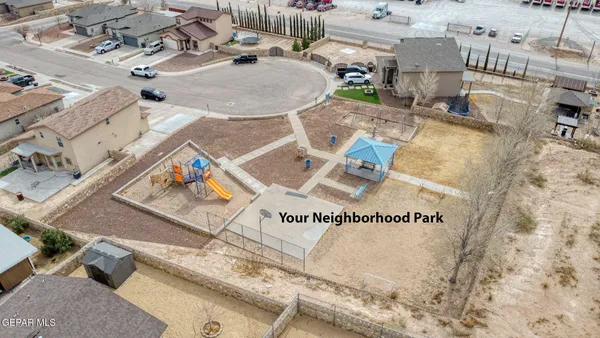 an aerial view of a fireplace with table and chairs in it