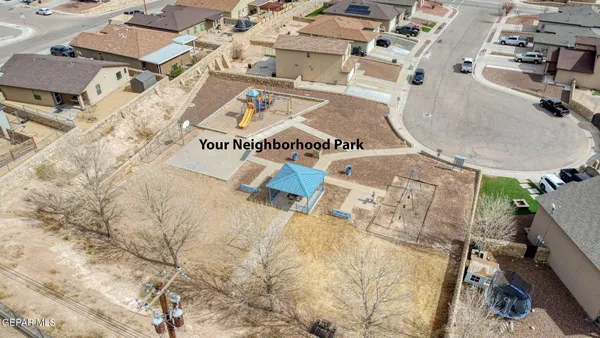 an aerial view of a house with a outdoor space