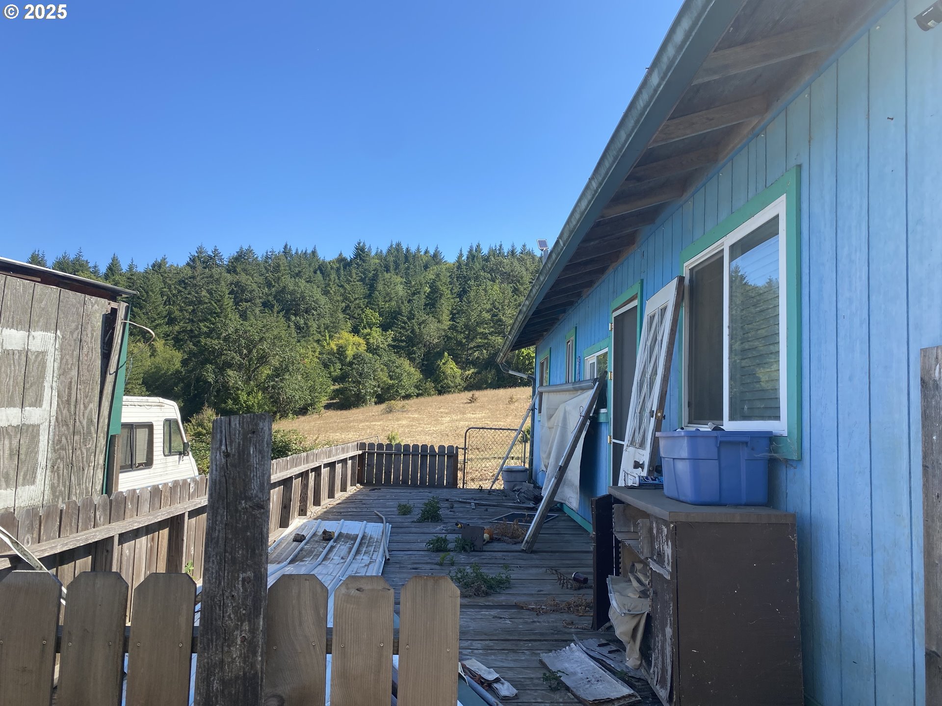 7555 Sawtell Road Sheridan, OR 97378 - Photo 12 of 31 a view of an house with backyard and deck