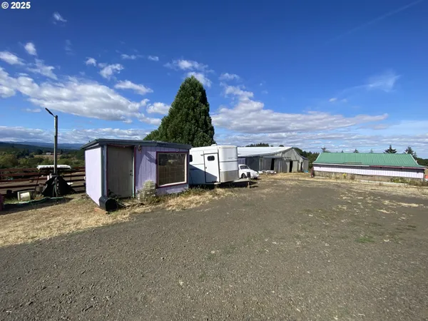 a view of a car park in front of a building