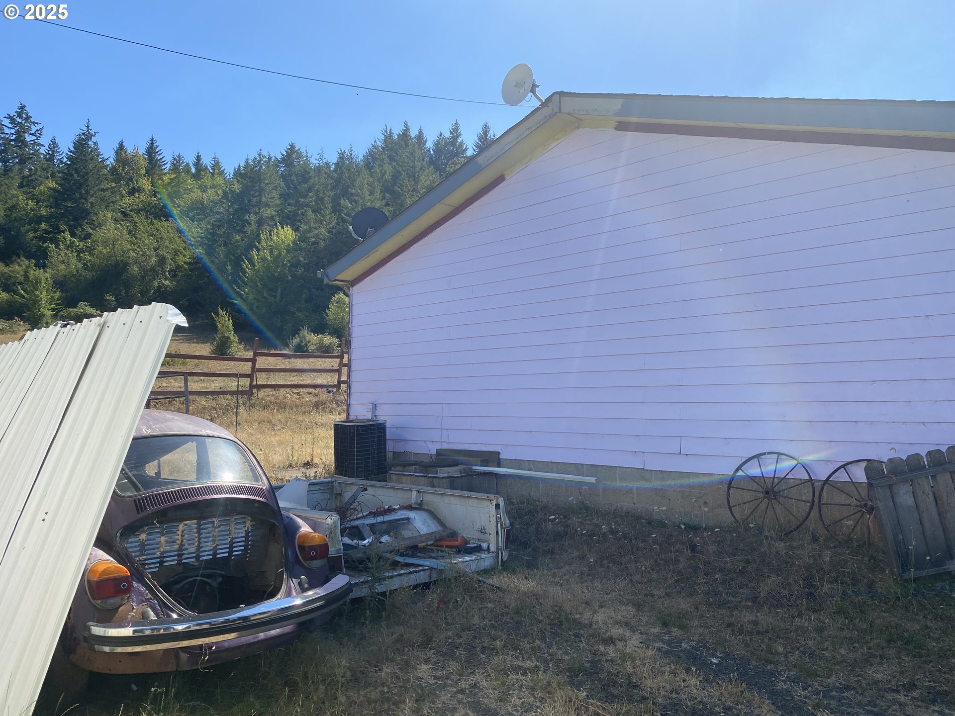 7555 Sawtell Road Sheridan, OR 97378 - Photo 5 of 31 a view of a backyard with plants and trees