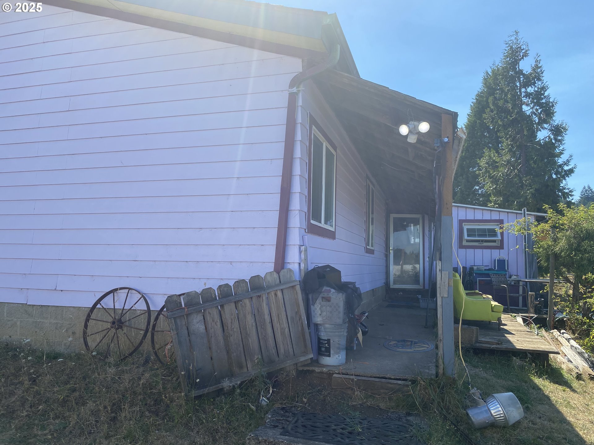 7555 Sawtell Road Sheridan, OR 97378 - Photo 6 of 31 a view of a chairs in front of house