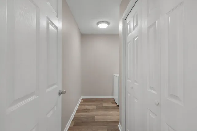 a view of a bathroom with sink and shower