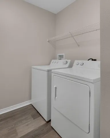 a utility room with dryer and washer