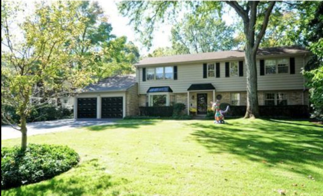 1154 Sheridan Road Highland Park, IL 60035 - Photo 1 of 1 a view of a house with a swimming pool