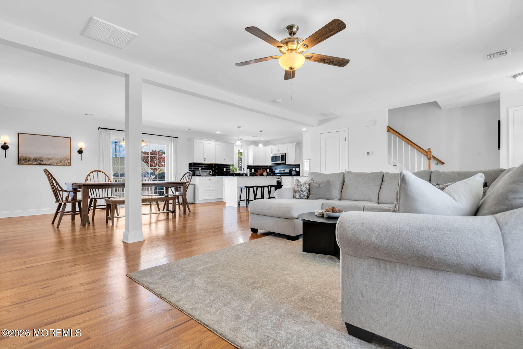 312 Beach Boulevard Forked River, NJ 08731 - Photo 9 of 40 a living room with furniture and kitchen view