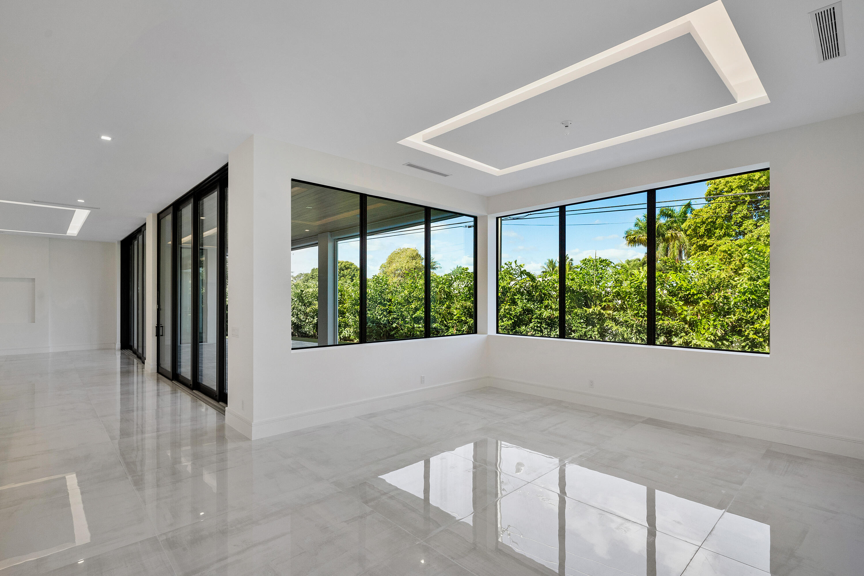 10 Coconut Road Delray Beach, FL 33444 - Photo 10 of 41 a view of an empty room with a window