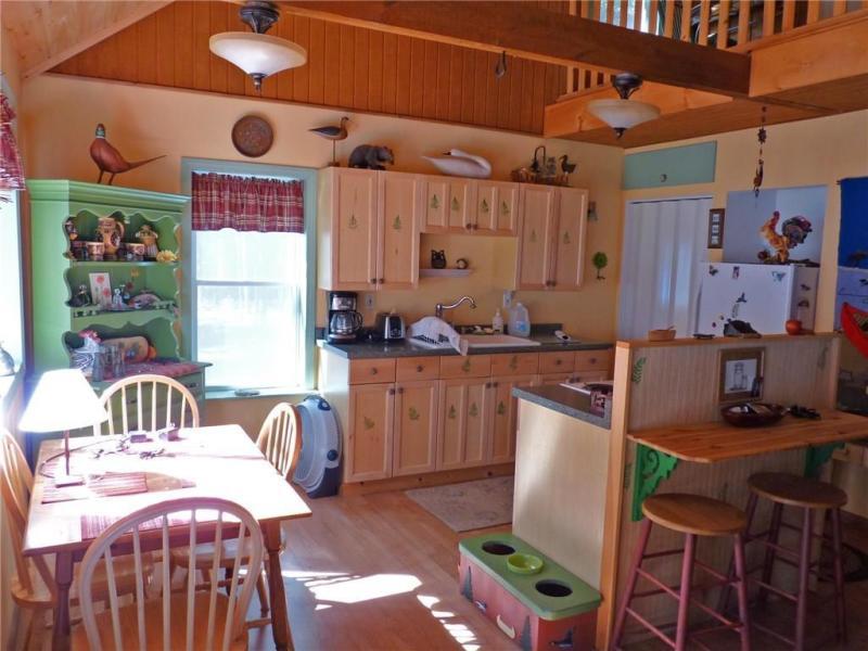 99 Silsby Road Mariaville, ME 04605 - Photo 8 of 18 Open kitchen and dining area