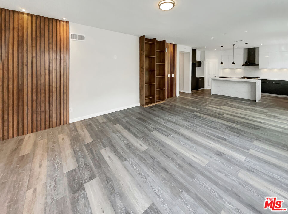 125 Lakeside Drive Buena Park, CA 90621 - Photo 27 of 57 a view of kitchen with wooden floor and electronic appliances