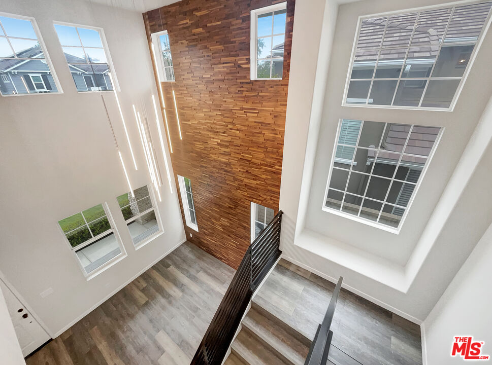 125 Lakeside Drive Buena Park, CA 90621 - Photo 33 of 57 a view of an entryway with wooden floor and door