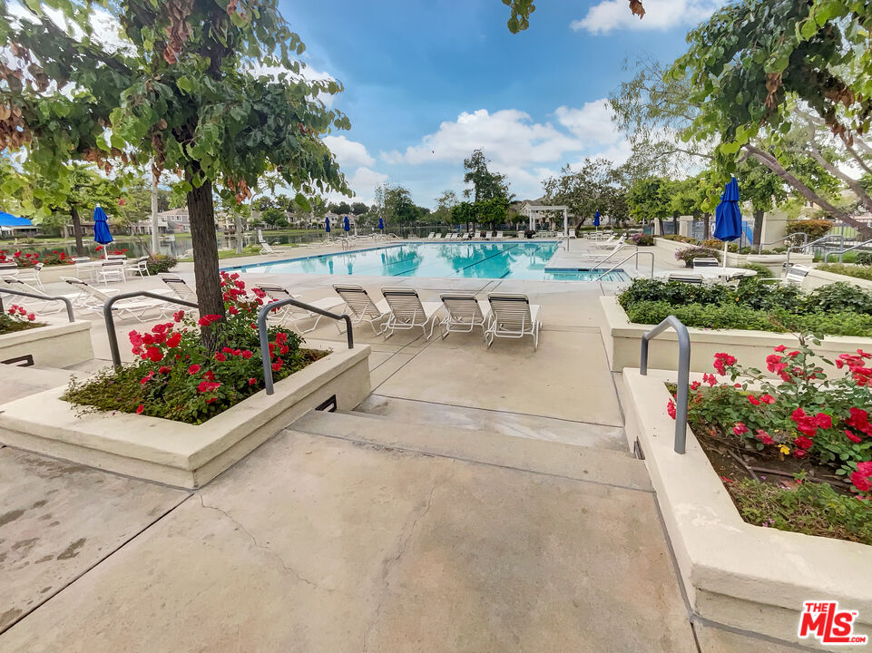 125 Lakeside Drive Buena Park, CA 90621 - Photo 35 of 57 a view of a garden with flowers and trees