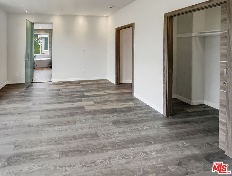 125 Lakeside Drive Buena Park, CA 90621 - Photo 37 of 57 a view of a room with wooden floor