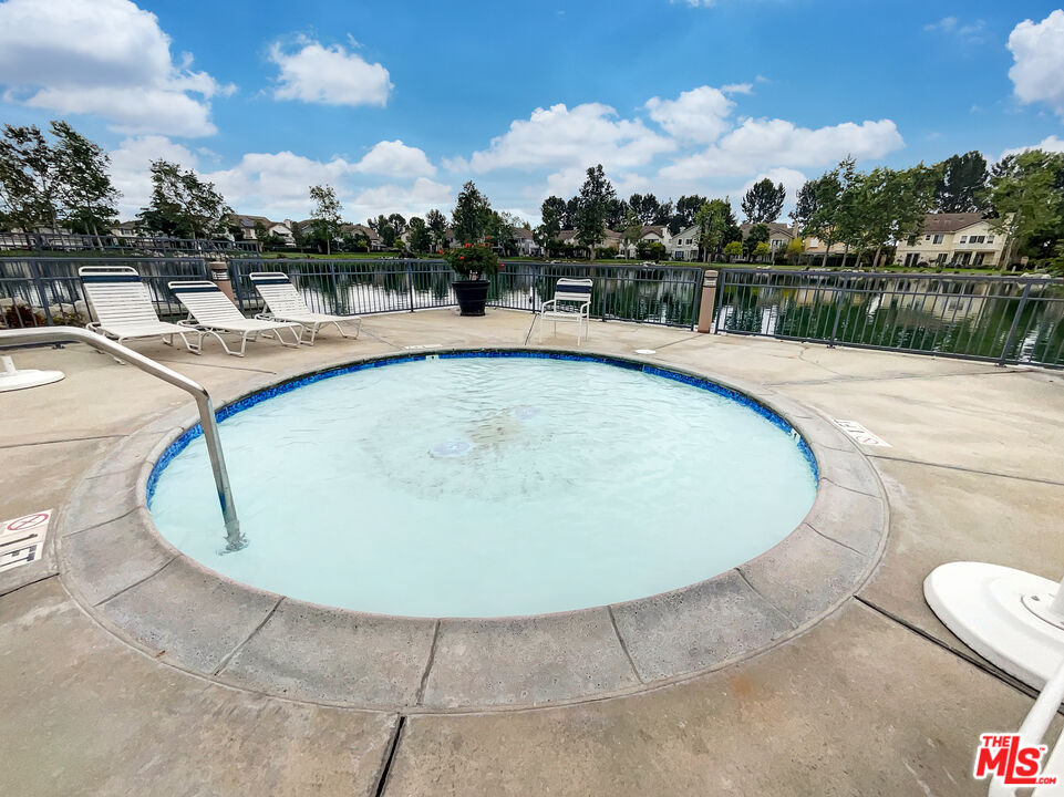 125 Lakeside Drive Buena Park, CA 90621 - Photo 39 of 57 a view of a swimming pool with a lake