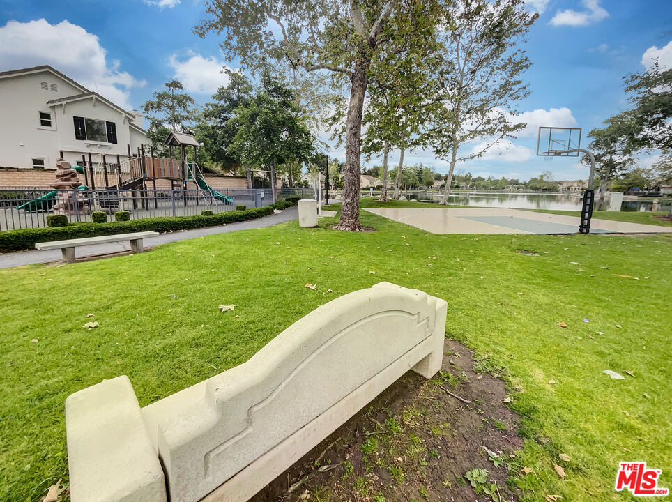 125 Lakeside Drive Buena Park, CA 90621 - Photo 40 of 57 a view of a house with a big yard and sitting area