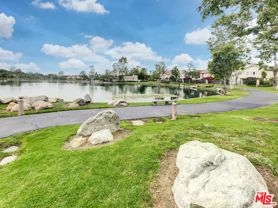 125 Lakeside Drive Buena Park, CA 90621 - Photo 43 of 57 a garden view with a lake view