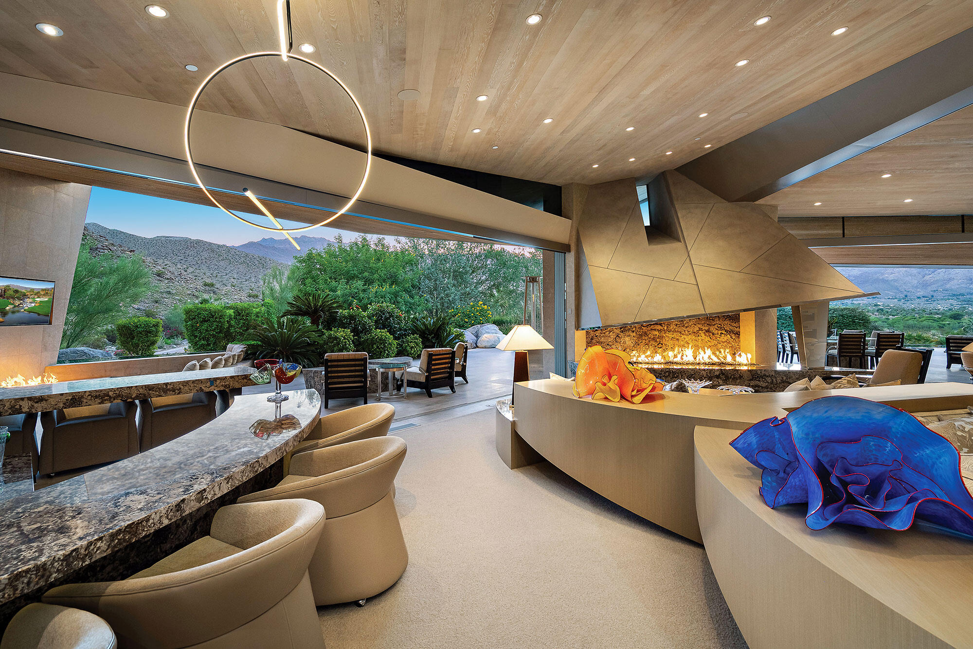 642 Pinnacle Crest Palm Desert, CA 92260 - Photo 15 of 29 a living room with furniture and a large window