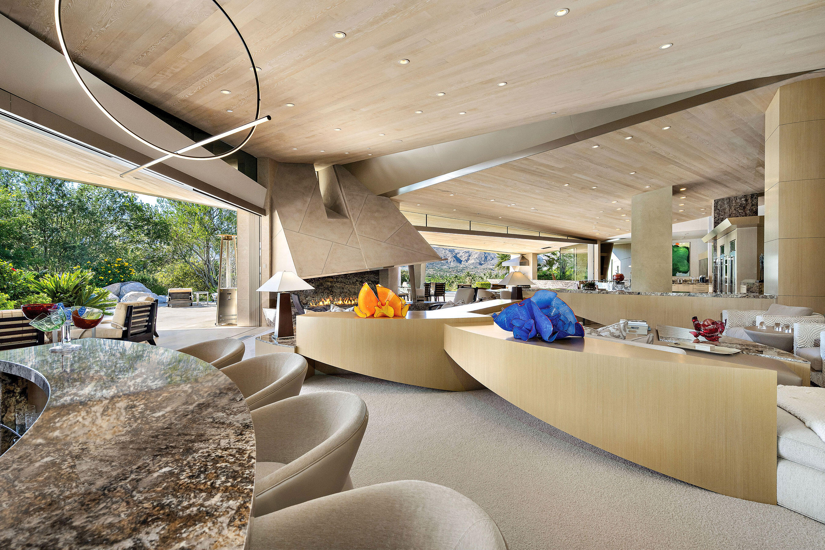 642 Pinnacle Crest Palm Desert, CA 92260 - Photo 5 of 29 a living room with furniture and a large window
