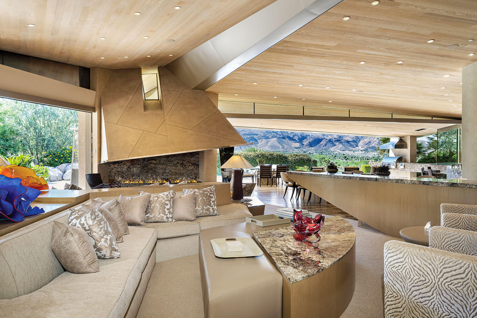 642 Pinnacle Crest Palm Desert, CA 92260 - Photo 7 of 29 a living room with furniture and a floor to ceiling window