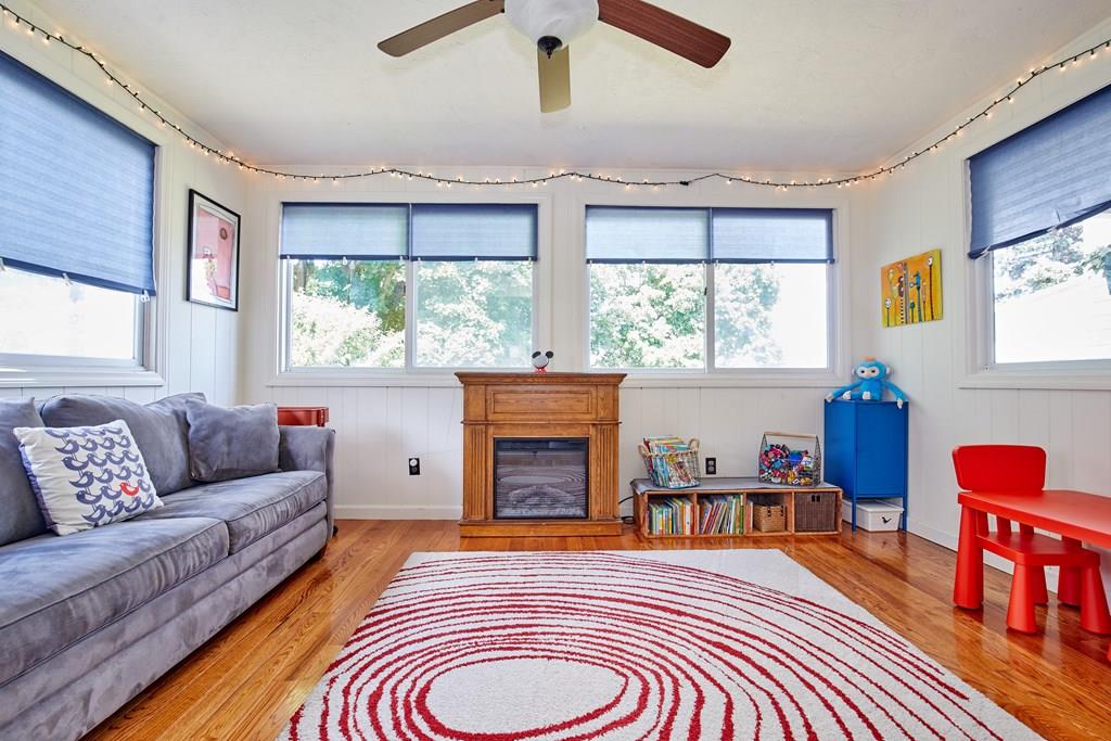 202 Metropolitan Avenue Boston, MA 02131 - Photo 11 of 31 a bedroom with furniture fireplace and window