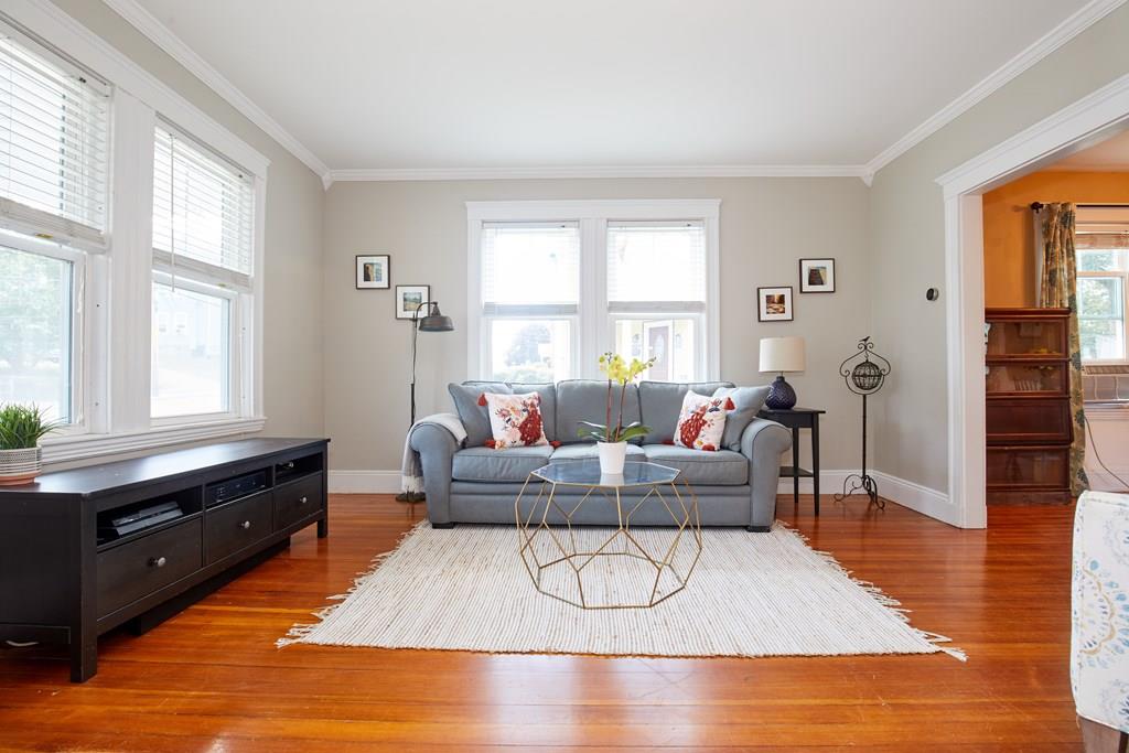 202 Metropolitan Avenue Boston, MA 02131 - Photo 16 of 31 a living room with furniture windows and wooden floor