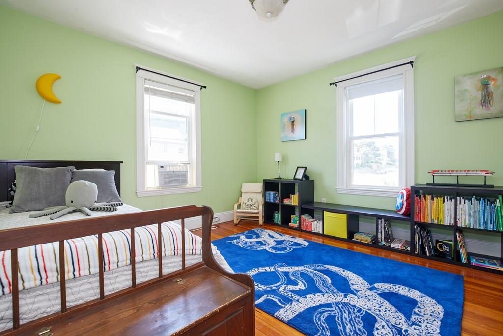 202 Metropolitan Avenue Boston, MA 02131 - Photo 20 of 31 a reading room with furniture window and book shelf